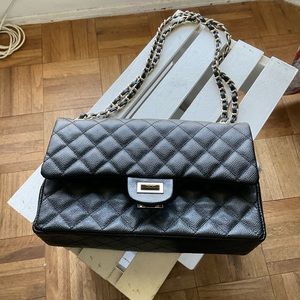 Black bag with gold metal handle